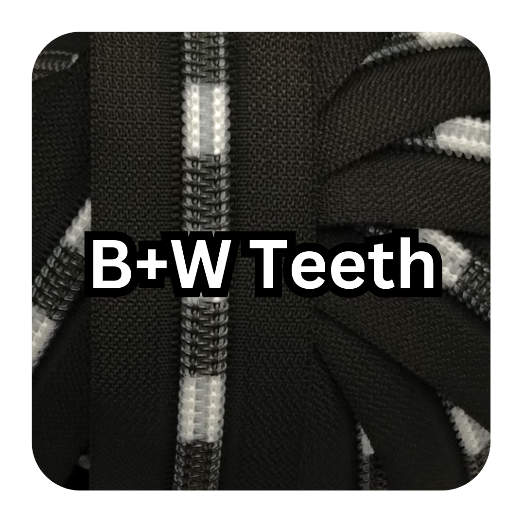 #5 Zipper - Black + White Teeth - by the meter - Sandworm Teeth at Atelier Fiber Arts