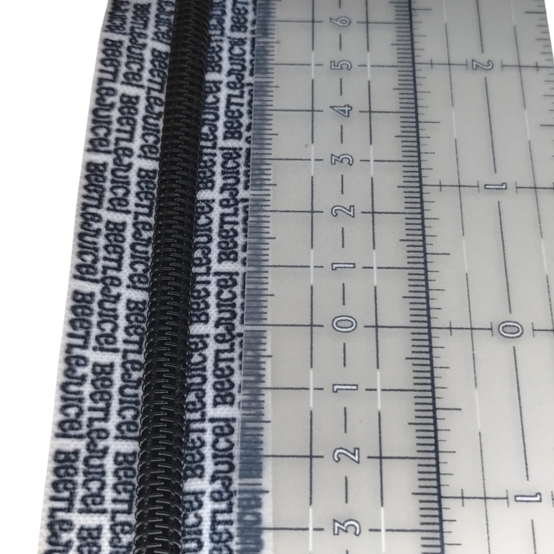 #5 Zipper - Beetlejuice Text - Black Teeth at Atelier Fiber Arts