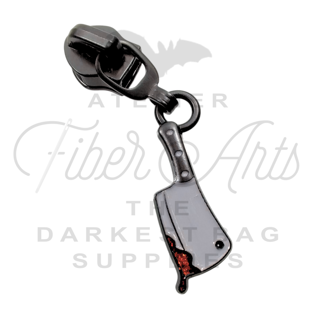 IN PRODUCTION #5 Chop Chop Zipper Pulls in Matte Black and Enamel at Atelier Fiber Arts