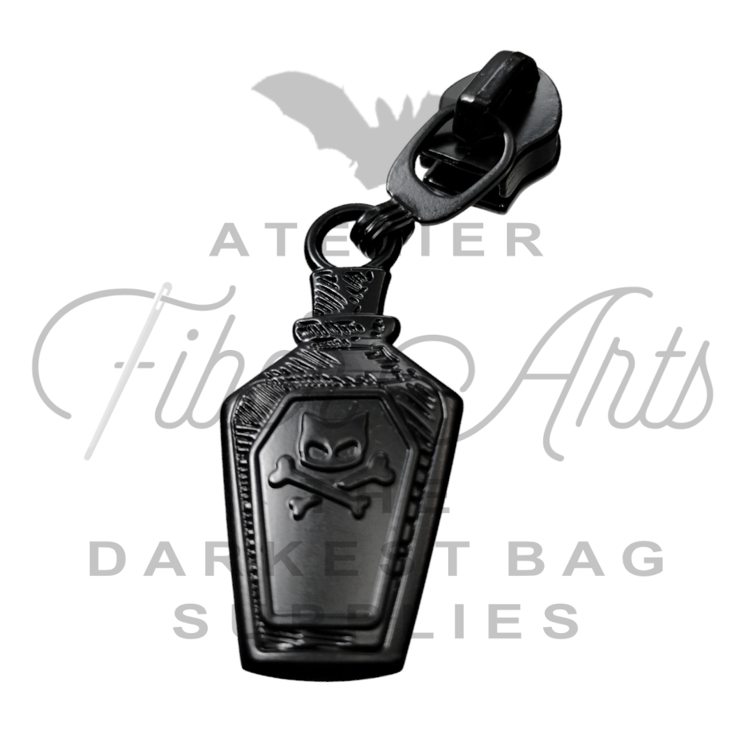 #5 Bottle of Poison Zipper Pulls in Matte Black at Atelier Fiber Arts