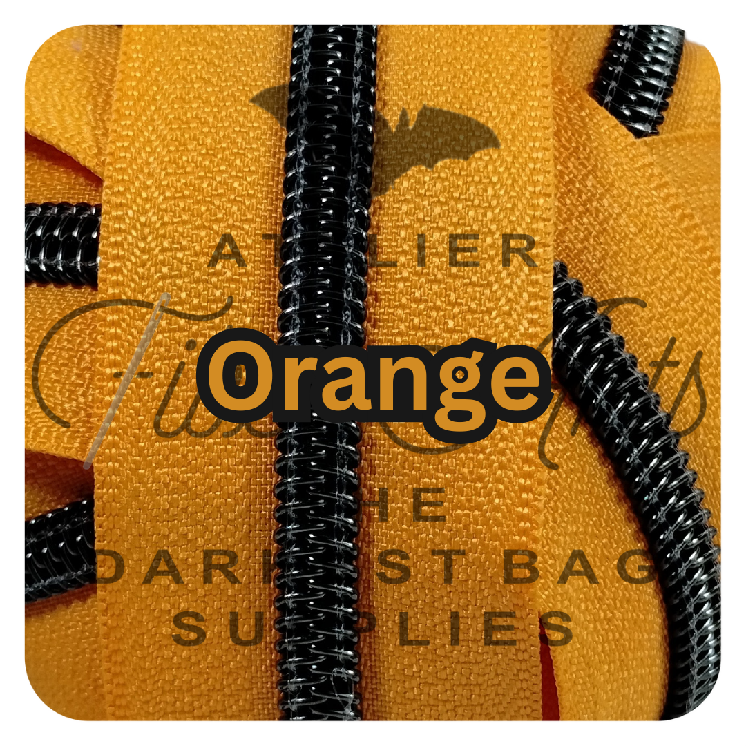 #5 Zipper - Orange - by the meter - Gunmetal Teeth at Atelier Fiber Arts