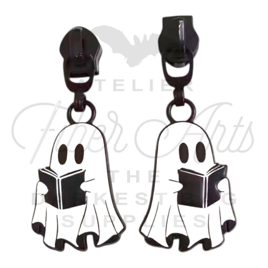 COMING SOON - Reading Ghost Zipper Pulls in Matte Black and Enamel at Atelier Fiber Arts