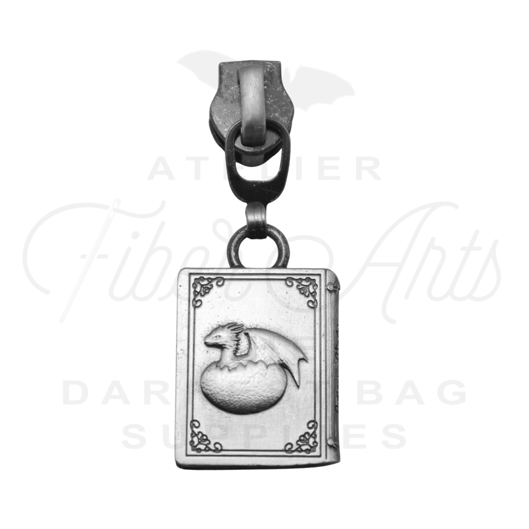 #5 Spicy Story Zipper Pulls in Antique Steel at Atelier Fiber Arts
