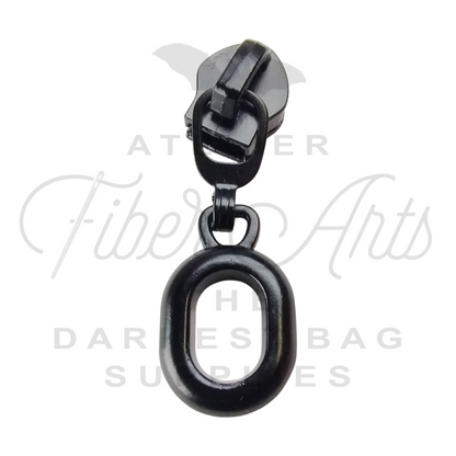 #5 Oval Zipper Pulls in Matte Black at Atelier Fiber Arts