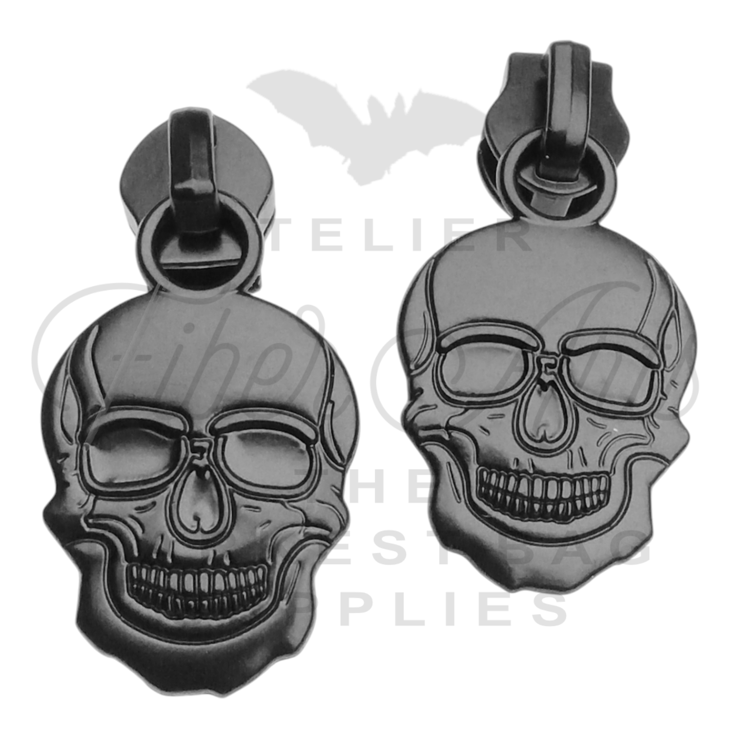 #5 Grinning Skull Zipper Pulls in Matte Black at Atelier Fiber Arts