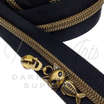 #5 Mercat with Green Eyes Zipper Pulls in Antique Gold at Atelier Fiber Arts